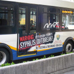 MAX bus in downtown Birmingham, AL with syphilis epidemic ad